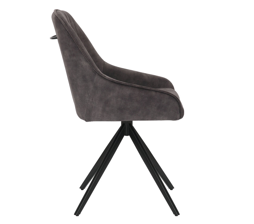 Side view of the Sofia light grey swivel dining chairs with black metal legs and velvet seat.