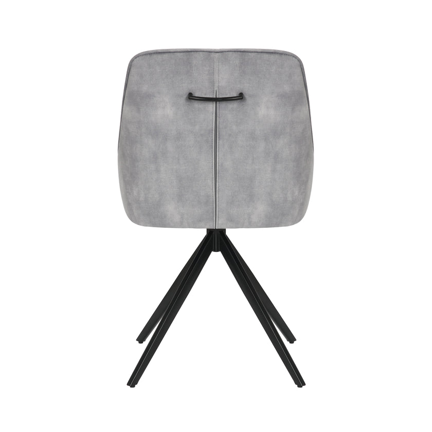 Back view of the Sofia light grey swivel dining chairs with black metal legs and velvet seat.