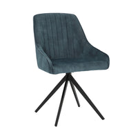 Angled view of the Sofia velvet blue swivel dining chairs with black metal legs and velvet seat.