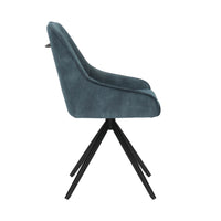 Side view of the Sofia velvet blue swivel dining chairs with black metal legs and velvet seat.