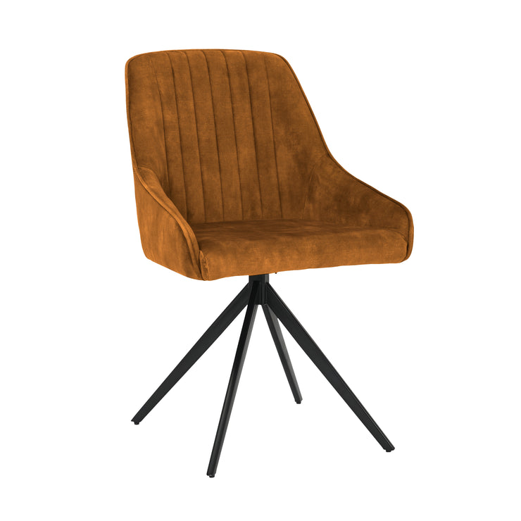 Angled image of the Sofia Mustard swivel dining chairs with black metal legs and velvet upholstery.