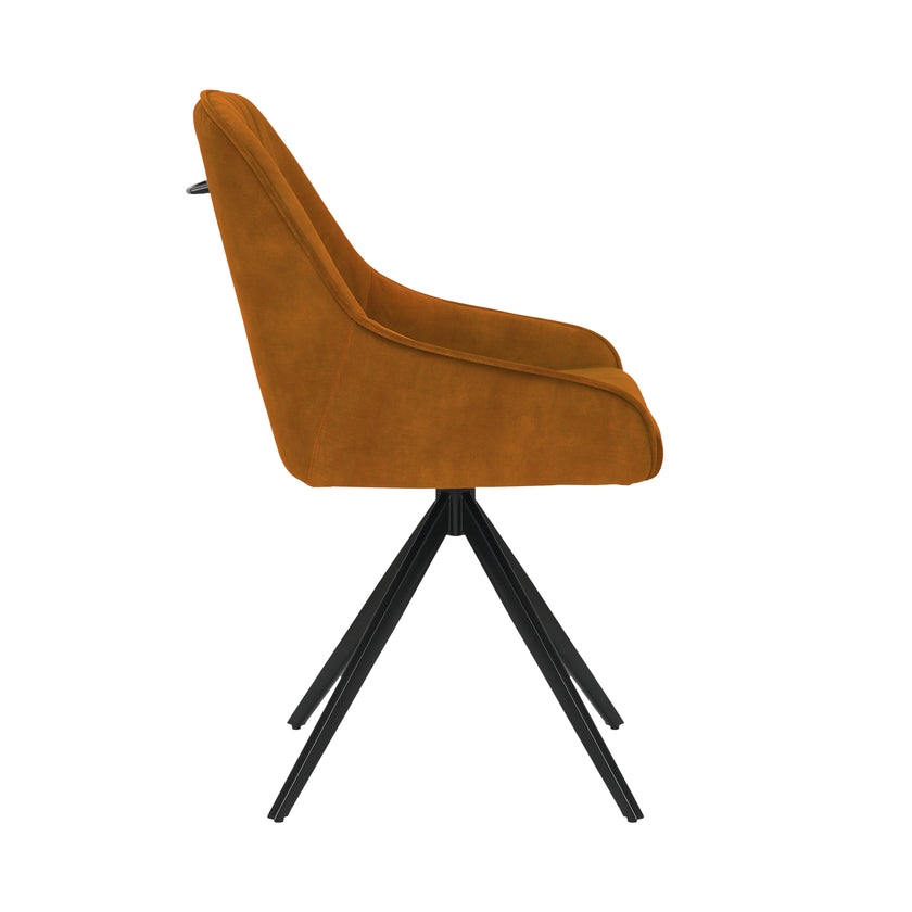 Side image of the Sofia Mustard swivel dining chairs with black metal legs and velvet upholstery.