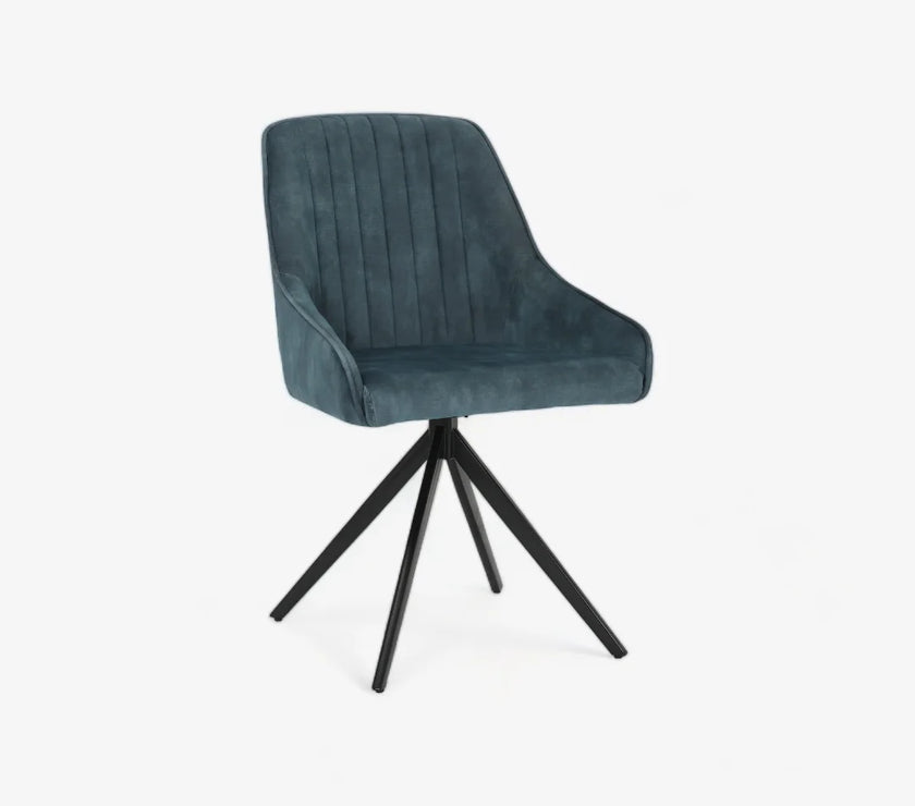 Front and angled view of the Sofia velvet blue swivel dining chairs with black metal legs and velvet seat.