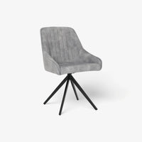 Front and angled image of the Sofia light grey swivel dining chairs with black metal legs and velvet seat.