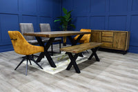 image of our new york dining table styled with chairs. It is a wooden dining table. Also it is a reclaimed wood dining table. 