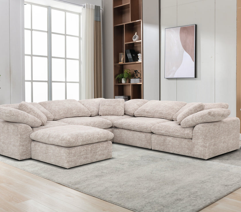 Image of the Cloud Modular Corner Sofa in a room with the footstool attatched