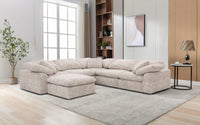 Image of the Cloud Modular Corner Sofa in a room with the footstool attatched