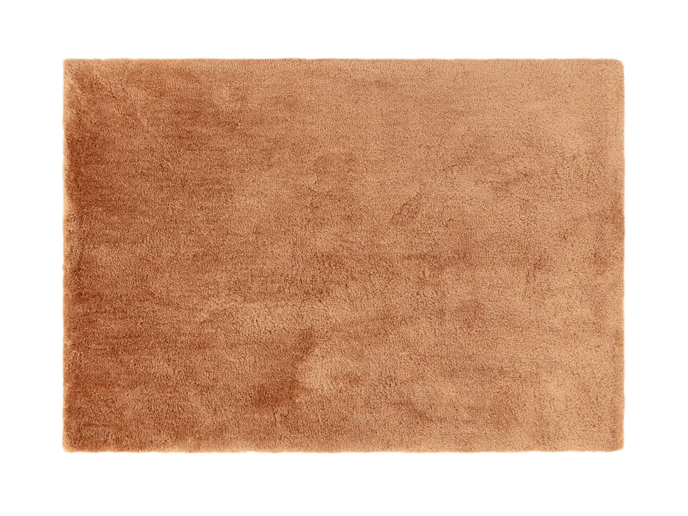 A terracotta rug on white background. 