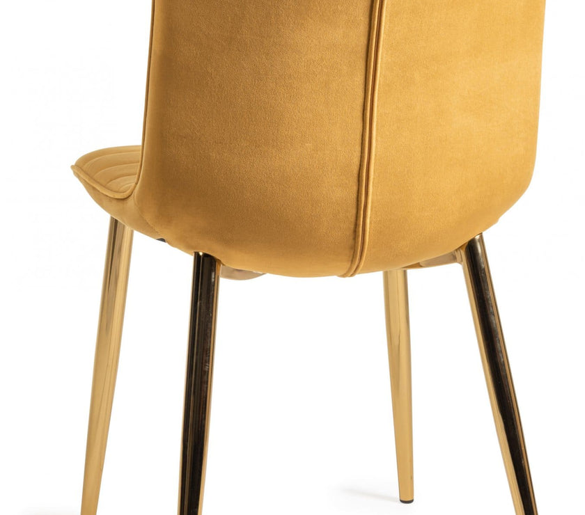Back and angled image of the Aso Velvet Dining Chairs with tapered back, light-reflecting velvet, and golden tapered legs.
