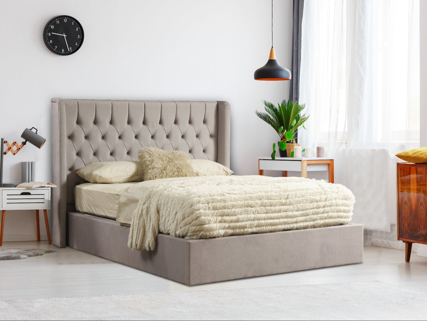 Angled view of the Faro Ottoman Bed Frame in a room