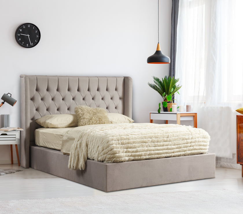 Angled view of the Faro Ottoman Bed Frame in a room