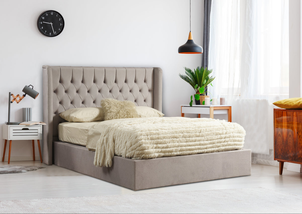 Angled view of the Faro Ottoman Bed Frame in a room