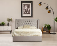 Front view of the Faro Ottoman Bed Frame in a room