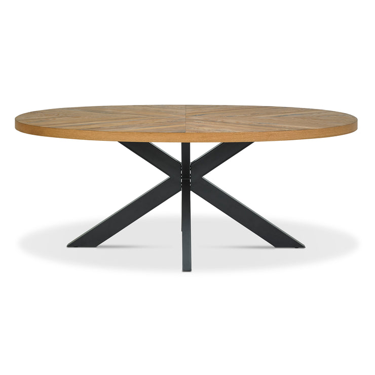 Front view of the Elliot Rustic Oak Oval Dining Table.