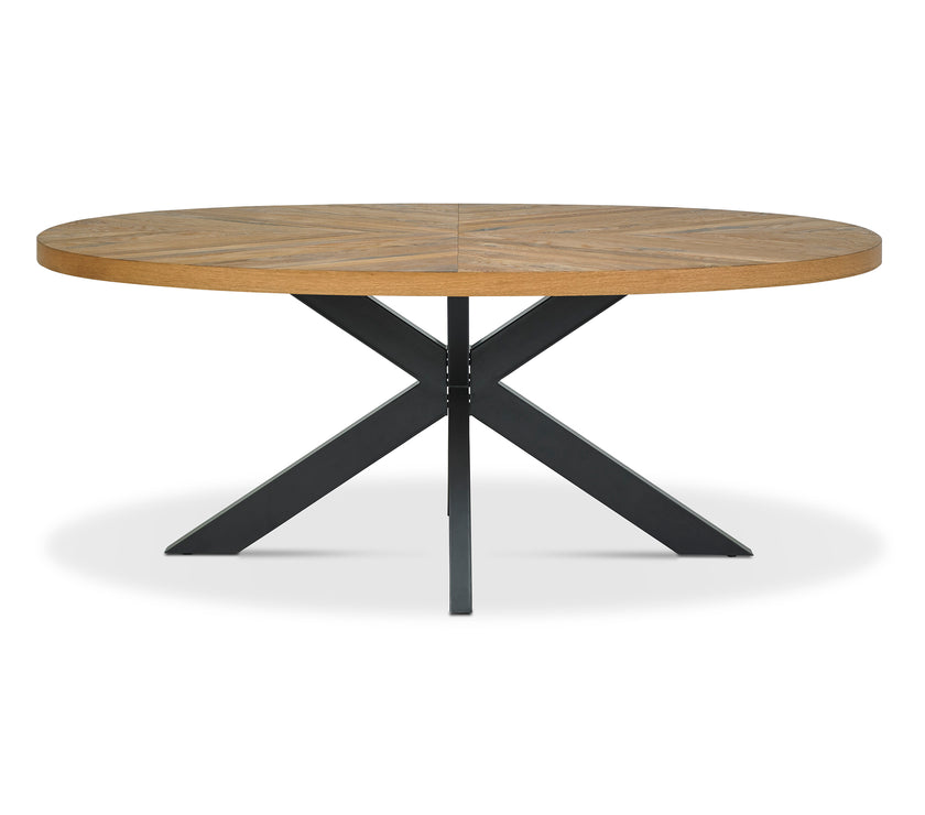Front view of the Elliot Rustic Oak Oval Dining Table.