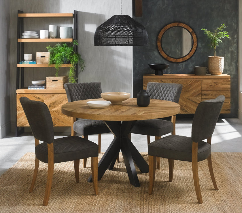 Image of the Elliot Rustic Oak Round Dining Table being styled with NCF's Dining Furniture.