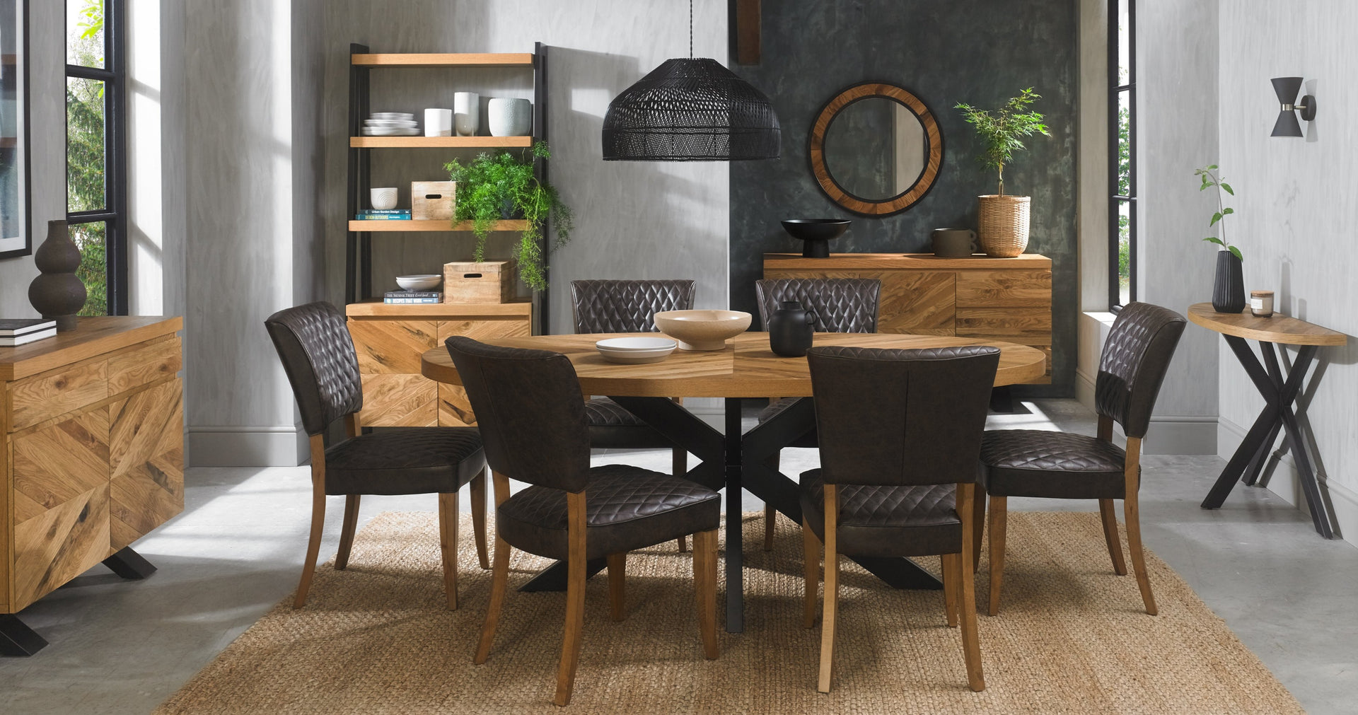 Image of the Elliot Rustic Oak Oval Dining Table styled with NCF's Dining Furniture.