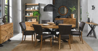 Image of the Elliot Rustic Oak Oval Dining Table styled with NCF's Dining Furniture.