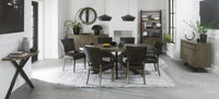 Image of the Landon Fumed Oak Dining Chairs Saddle Faux Leather with dark oak frame styled with NCF's Dining Furniture.
