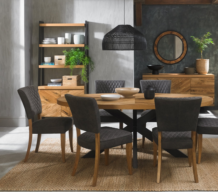 Image of the Landon Rustic Oak Dining Chairs with lightly oiled oak frame and dark grey fabric seat styled with NCF's Dining Furniture.