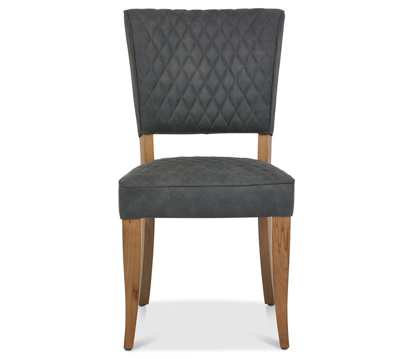 Front view of the Landon Rustic Oak Dining Chairs with lightly oiled oak frame and dark grey fabric seat.