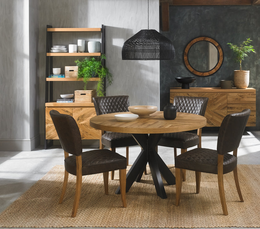 Image of the Landon Rustic Oak Dining Chairs with lightly oiled oak frame and saddle brown faux leather seat styled with NCF's Dining Furniture.
