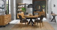 Image of the Landon Rustic Oak Dining Chairs with lightly oiled oak frame and saddle brown faux leather seat styled with NCF's Dining Furniture.