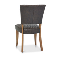 Back and angled image of the Landon Rustic Oak Dining Chairs with lightly oiled oak frame and saddle brown faux leather seat.