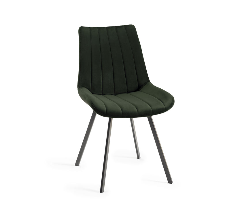Front and angled image of the Savio Dining Chairs in green velvet with vertical stitching and metal legs.