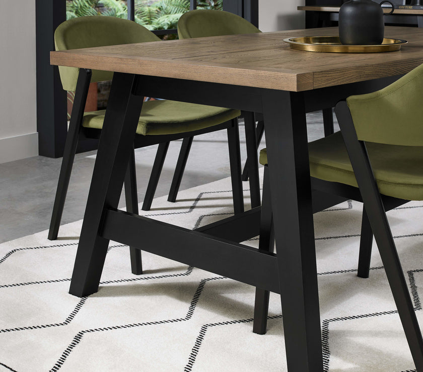 Image of the Candice 6-8 Seater Extendable Dining Table styled with some dining furniture
