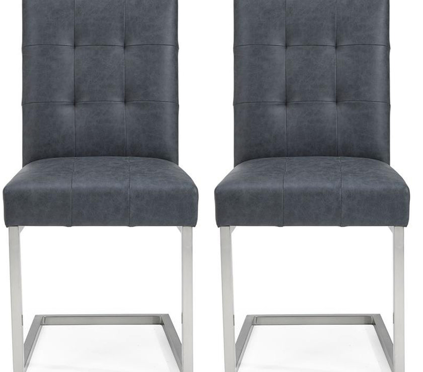 Front view of the Toulouse Cantilever Faux Leather Dining Chairs with dark oiled oak, black oak accents, and satin nickel frame.